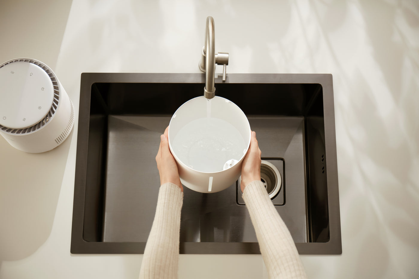 Refilling Mistfree's removable tank directly from a faucet